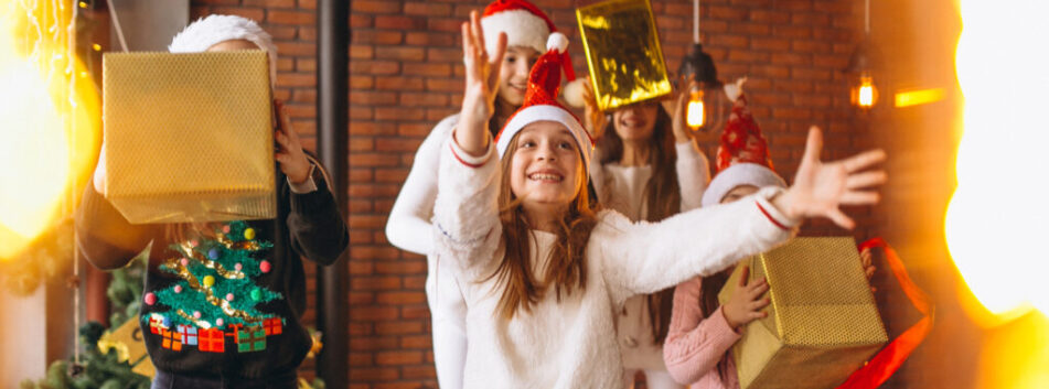 Group of kids with Christmas presents